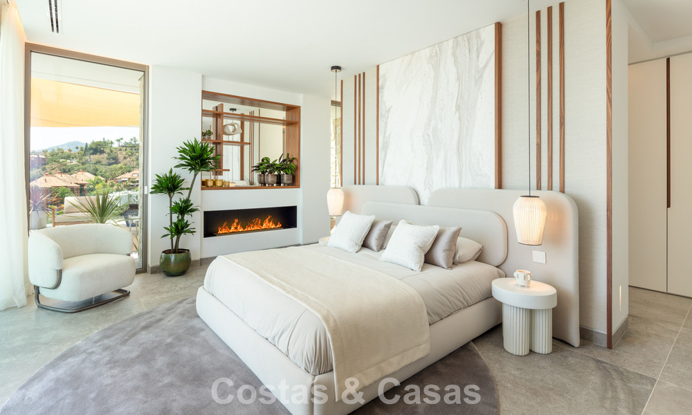 Verbluffende, architecturale luxevilla te koop met open zeezicht in een hoogstaande gated woonwijk in de heuvels van La Quinta in Marbella - Benahavis 54128
