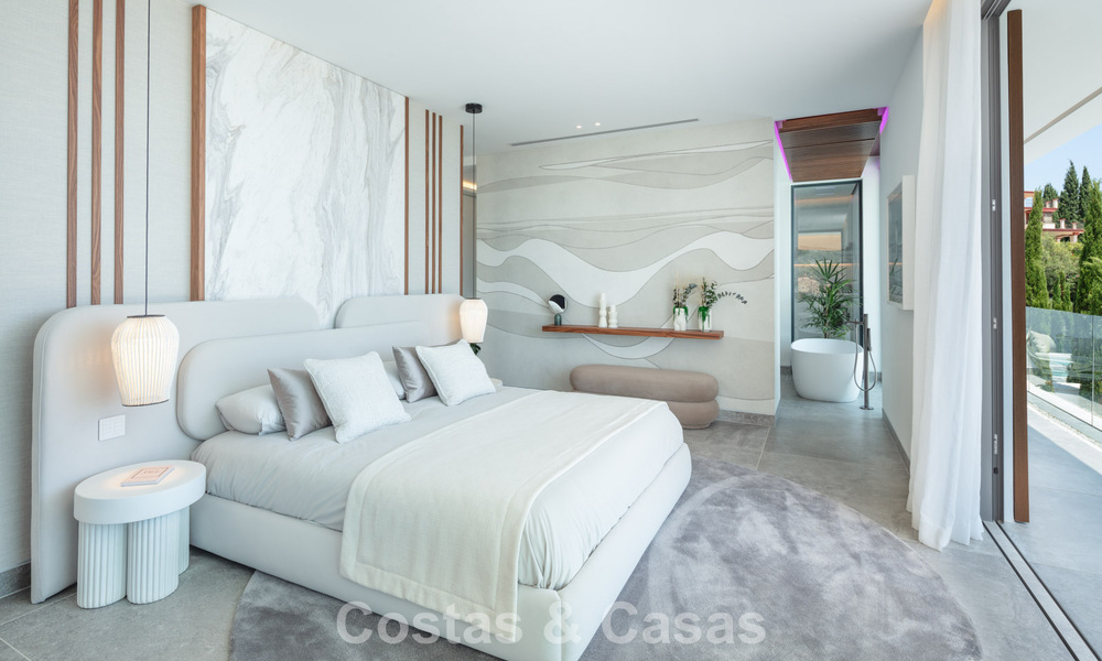 Verbluffende, architecturale luxevilla te koop met open zeezicht in een hoogstaande gated woonwijk in de heuvels van La Quinta in Marbella - Benahavis 54129
