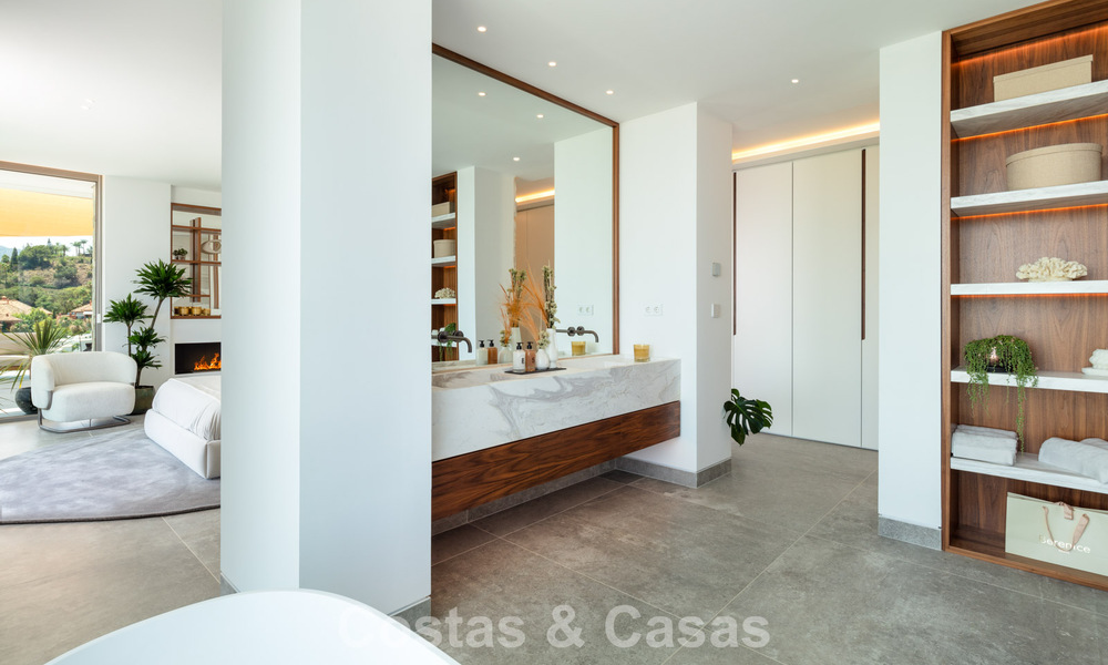 Verbluffende, architecturale luxevilla te koop met open zeezicht in een hoogstaande gated woonwijk in de heuvels van La Quinta in Marbella - Benahavis 54131