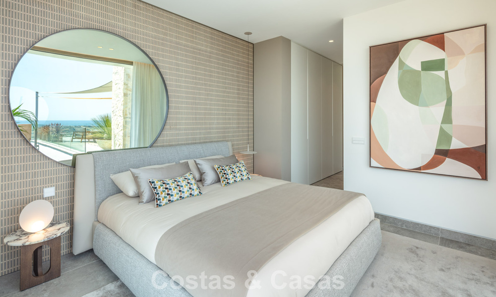 Verbluffende, architecturale luxevilla te koop met open zeezicht in een hoogstaande gated woonwijk in de heuvels van La Quinta in Marbella - Benahavis 54133