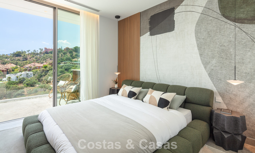 Verbluffende, architecturale luxevilla te koop met open zeezicht in een hoogstaande gated woonwijk in de heuvels van La Quinta in Marbella - Benahavis 54135