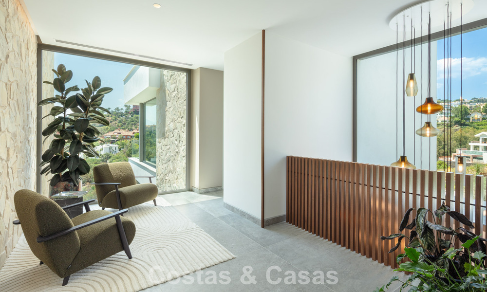 Verbluffende, architecturale luxevilla te koop met open zeezicht in een hoogstaande gated woonwijk in de heuvels van La Quinta in Marbella - Benahavis 54136