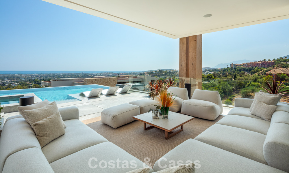 Verbluffende, architecturale luxevilla te koop met open zeezicht in een hoogstaande gated woonwijk in de heuvels van La Quinta in Marbella - Benahavis 54143