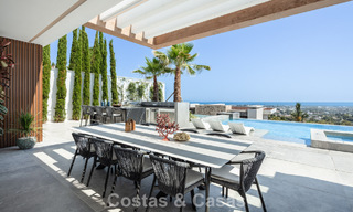 Verbluffende, architecturale luxevilla te koop met open zeezicht in een hoogstaande gated woonwijk in de heuvels van La Quinta in Marbella - Benahavis 54146 