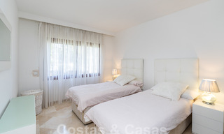 Luxueus tuinappartement te koop in een frontlinie strandcomplex op de New Golden Mile tussen Marbella en Estepona 55296 