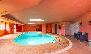 Luxueus tuinappartement te koop in een frontlinie strandcomplex op de New Golden Mile tussen Marbella en Estepona 55312 