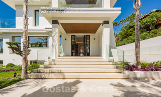 Nieuwe, modernistische designervilla te koop met uitzicht op de golfbaan in een golfresort, Marbella - Benahavis 55505 
