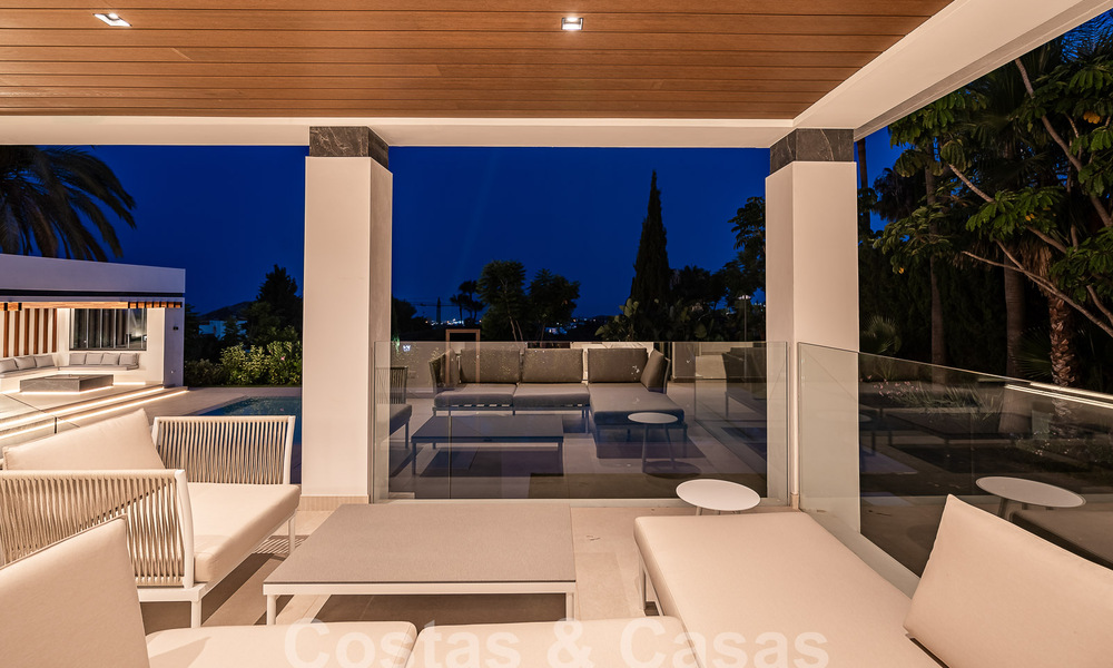 Nieuwe, modernistische designervilla te koop met uitzicht op de golfbaan in een golfresort, Marbella - Benahavis 55541