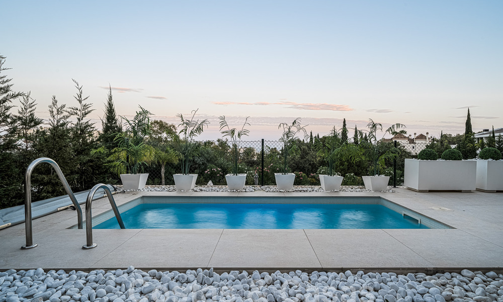 Luxueus, modern, begane grond appartement te koop met verwarmd privézwembad en zeezicht in Marbella - Benahavis 55645