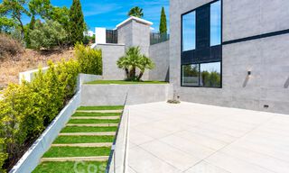 Nieuwe, modernistische designervilla te koop met prachtig zeezicht in vijfsterren golfresort te Marbella - Benahavis 55829 