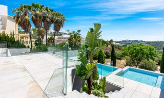 Nieuwe, modernistische designervilla te koop met prachtig zeezicht in vijfsterren golfresort te Marbella - Benahavis 55830 