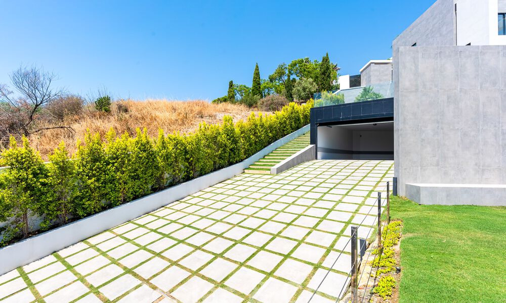Nieuwe, modernistische designervilla te koop met prachtig zeezicht in vijfsterren golfresort te Marbella - Benahavis 55837