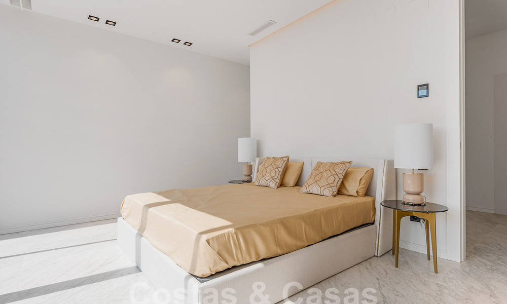 Nieuwe, modernistische designervilla te koop met prachtig zeezicht in vijfsterren golfresort te Marbella - Benahavis 55840