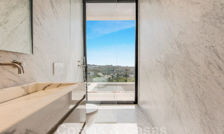 Nieuwe, modernistische designervilla te koop met prachtig zeezicht in vijfsterren golfresort te Marbella - Benahavis 55842 