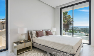 Nieuwe, modernistische designervilla te koop met prachtig zeezicht in vijfsterren golfresort te Marbella - Benahavis 55844 