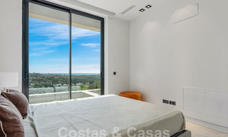 Nieuwe, modernistische designervilla te koop met prachtig zeezicht in vijfsterren golfresort te Marbella - Benahavis 55845 