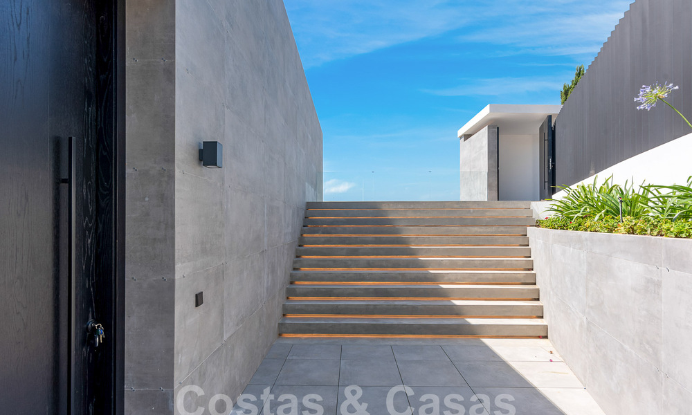 Nieuwe, modernistische designervilla te koop met prachtig zeezicht in vijfsterren golfresort te Marbella - Benahavis 55849