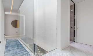 Nieuwe, modernistische designervilla te koop met prachtig zeezicht in vijfsterren golfresort te Marbella - Benahavis 55857 
