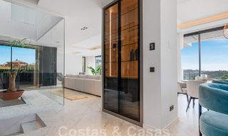 Nieuwe, modernistische designervilla te koop met prachtig zeezicht in vijfsterren golfresort te Marbella - Benahavis 55864 