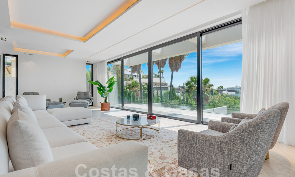 Nieuwe, modernistische designervilla te koop met prachtig zeezicht in vijfsterren golfresort te Marbella - Benahavis 55870