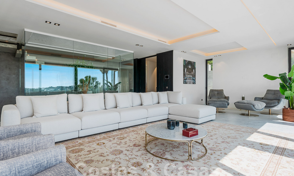 Nieuwe, modernistische designervilla te koop met prachtig zeezicht in vijfsterren golfresort te Marbella - Benahavis 55871