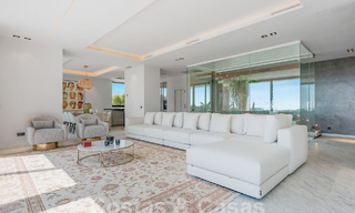 Nieuwe, modernistische designervilla te koop met prachtig zeezicht in vijfsterren golfresort te Marbella - Benahavis 55875 