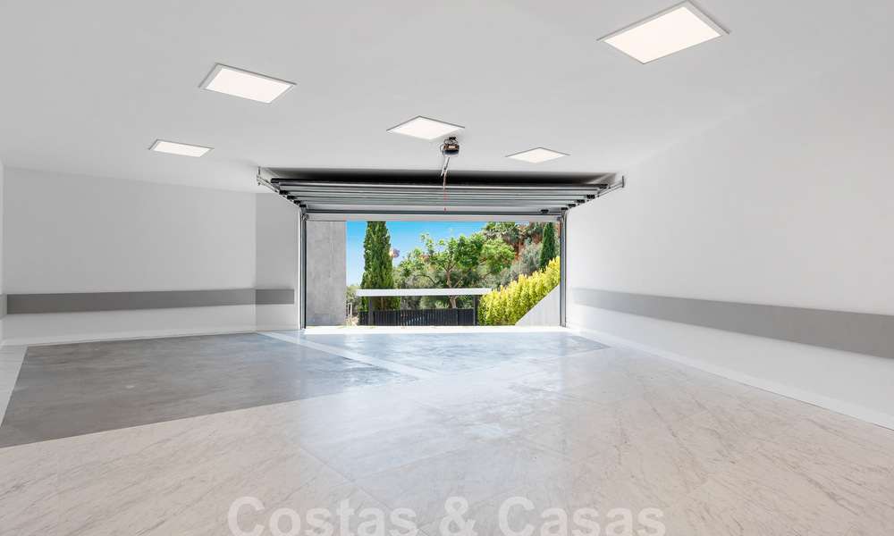Nieuwe, modernistische designervilla te koop met prachtig zeezicht in vijfsterren golfresort te Marbella - Benahavis 55885