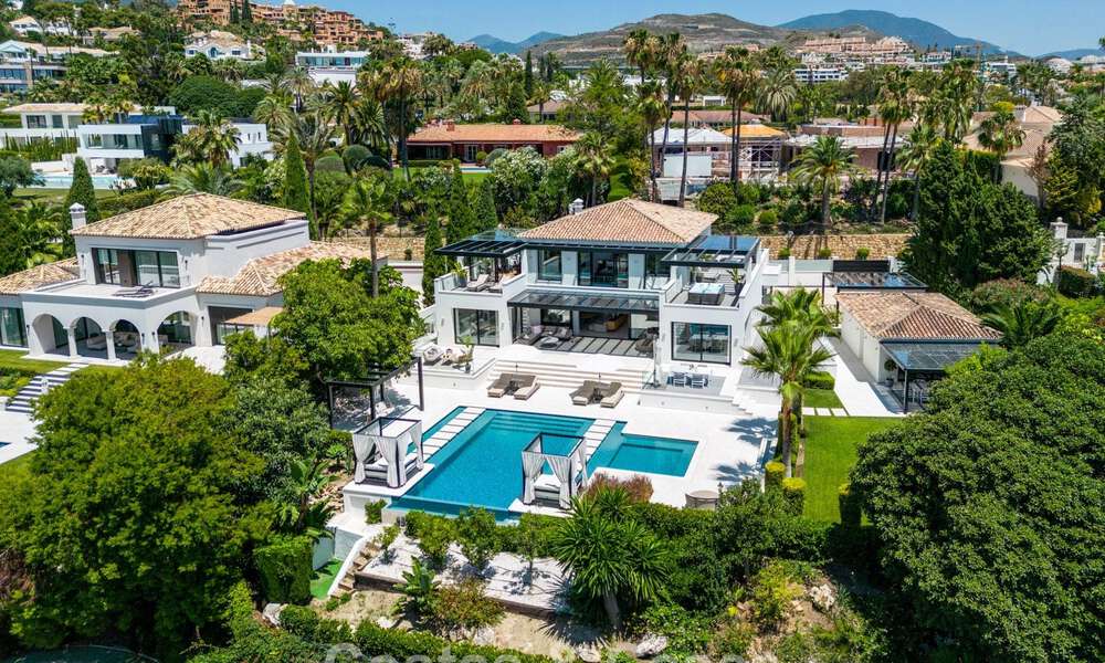Moderne, symmetrische luxevilla te koop op een steenworp van de golfbanen van Nueva Andalucia’s vallei, Marbella 56192