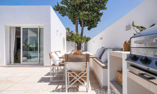 Sfeervolle luxevilla in Ibiza-stijl te koop, dicht bij alle voorzieningen van Nueva Andalucia, Marbella 56947 