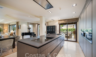 Luxe tuinappartement te koop met privézwembad in een hoogstaand complex in Nueva Andalucia, Marbella 58056 