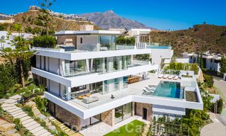 Luxueuze designervilla te koop in exclusief, gated frontlinie-golfcomplex met panoramisch uitzicht in La Quinta, Marbella - Benahavis 59074 