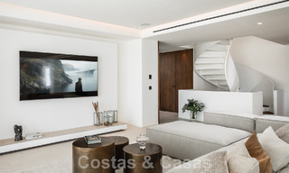 Luxueuze designervilla te koop in exclusief, gated frontlinie-golfcomplex met panoramisch uitzicht in La Quinta, Marbella - Benahavis 59087 