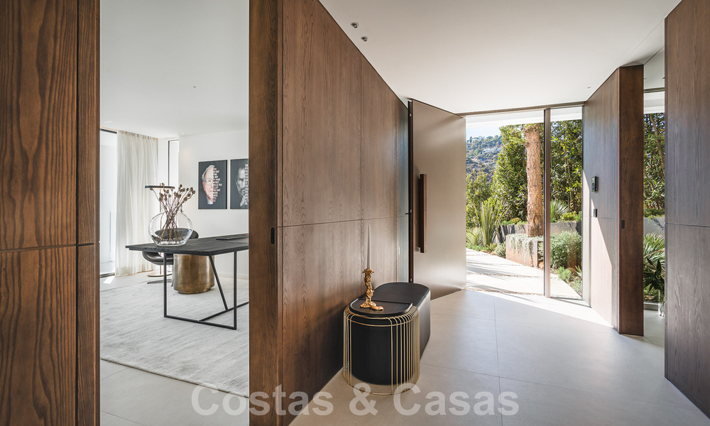 Luxueuze designervilla te koop in exclusief, gated frontlinie-golfcomplex met panoramisch uitzicht in La Quinta, Marbella - Benahavis 59095
