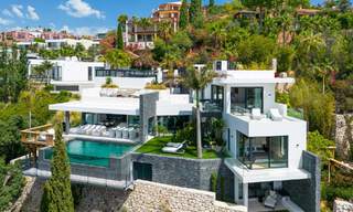 Prestigieuze, moderne luxevilla te koop met adembenemend zeezicht in een gated community in Marbella - Benahavis 58723 