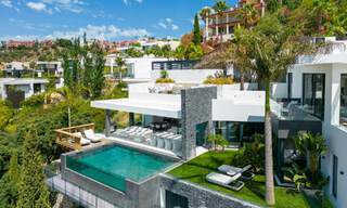 Prestigieuze, moderne luxevilla te koop met adembenemend zeezicht in een gated community in Marbella - Benahavis 58726 