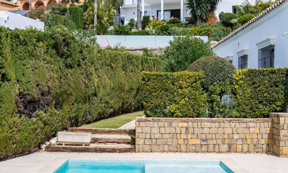 Andalusische luxevilla met een tijdloze charme te koop op eerstelijns golf in Benahavis - Marbella 58870