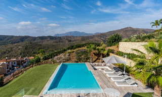 Moderne luxevilla te koop met zeezicht in een gated community omgeven door natuur in Marbella - Benahavis 59261 