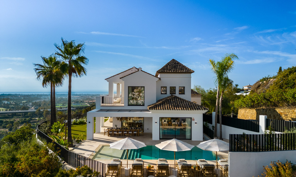 Moderne Andalusische luxevilla met onbelemmerd zeezicht te koop in een beveiligde wijk in La Quinta, Marbella - Benahavis 59529