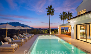 Moderne Andalusische luxevilla met onbelemmerd zeezicht te koop in een beveiligde wijk in La Quinta, Marbella - Benahavis 59530 