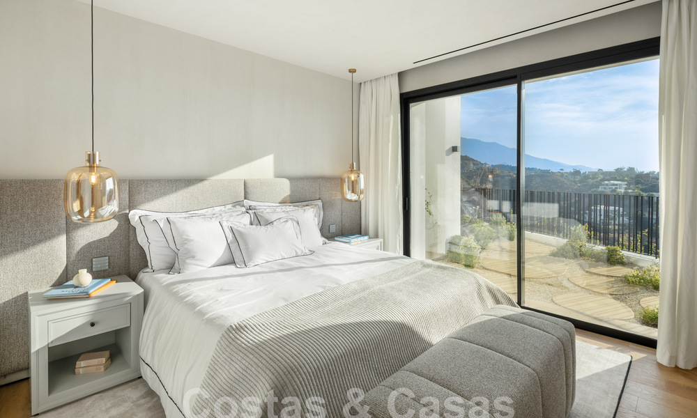 Moderne Andalusische luxevilla met onbelemmerd zeezicht te koop in een beveiligde wijk in La Quinta, Marbella - Benahavis 59541