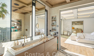 Moderne Andalusische luxevilla met onbelemmerd zeezicht te koop in een beveiligde wijk in La Quinta, Marbella - Benahavis 59545 