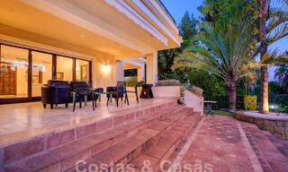 Tijdloze luxevilla met Andalusische charme te koop omgeven door golfbanen in Marbella - Benahavis 59680 