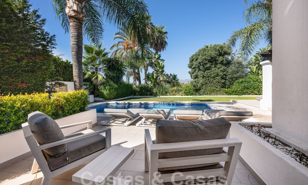 Eigentijdse Andalusische luxevilla te koop in een hoogstaande golfomgeving in Nueva Andalucia, Marbella 59977