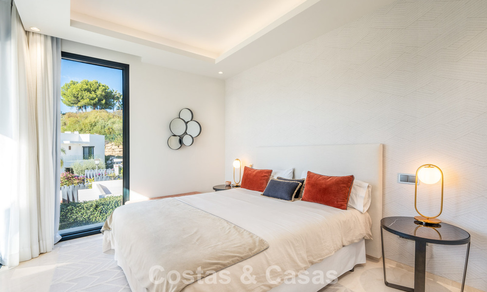 Geavanceerde luxevilla met strak design te koop in een gated community in Nueva Andalucia’s golfvallei in Marbella 60364