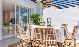 Modern gerenoveerd penthouse te koop met ruim terras en zeezicht in La Quinta golfresort, Benahavis - Marbella 60617 