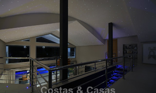 Moderne luxevilla te koop uitkijkend op de golfbaan in Nueva Andalucia, Marbella 60777 