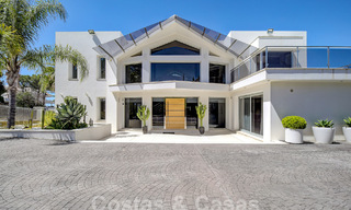 Moderne luxevilla te koop uitkijkend op de golfbaan in Nueva Andalucia, Marbella 60779 