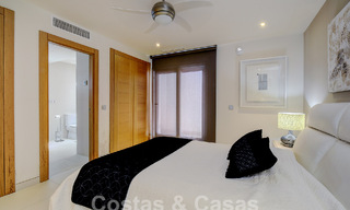 Moderne luxevilla te koop uitkijkend op de golfbaan in Nueva Andalucia, Marbella 60814 