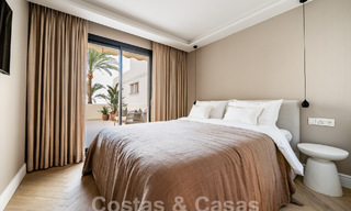 Kwalitatief gerenoveerd penthouse te koop met uitnodigend terras en zeezicht in Nueva Andalucia, Marbella 61153 