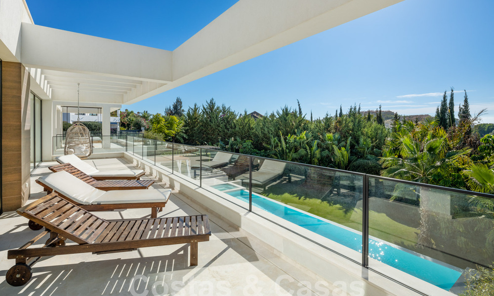 Instapklare, gesofisticeerde luxevilla te koop in Nueva Andalucia’s golfvallei, Marbella 61326